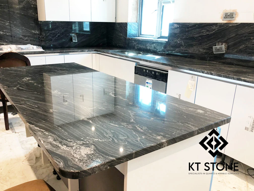 Black marble kitchen island worktop from a KT Stone project in London.