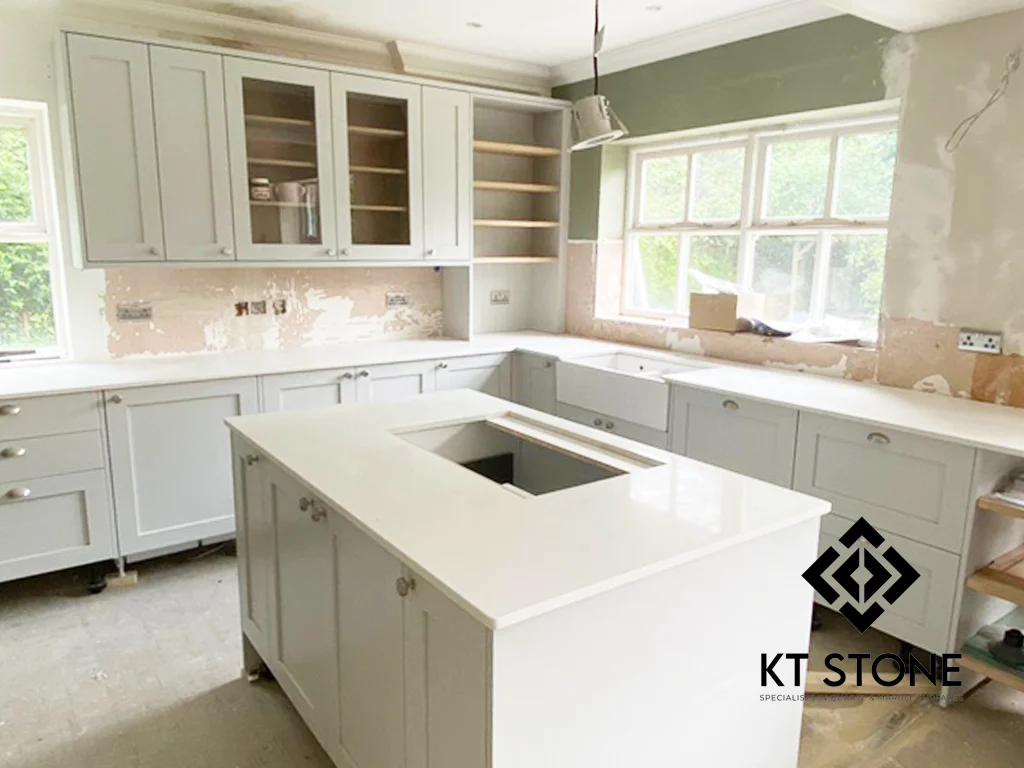 White quartz kitchen worktops and island from another angle in a KT Stone project in London.